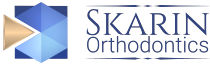 Skarin Orthodontics logo, dark version
