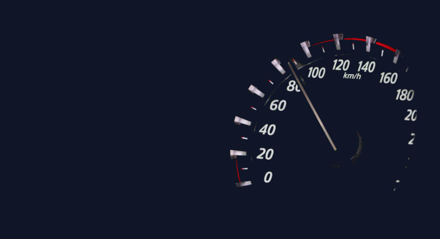A speedometer showing the needle going up